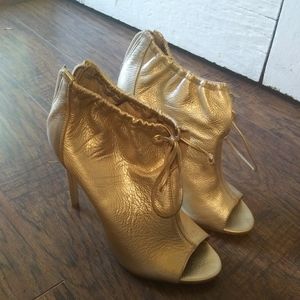 Gold zip-up heels